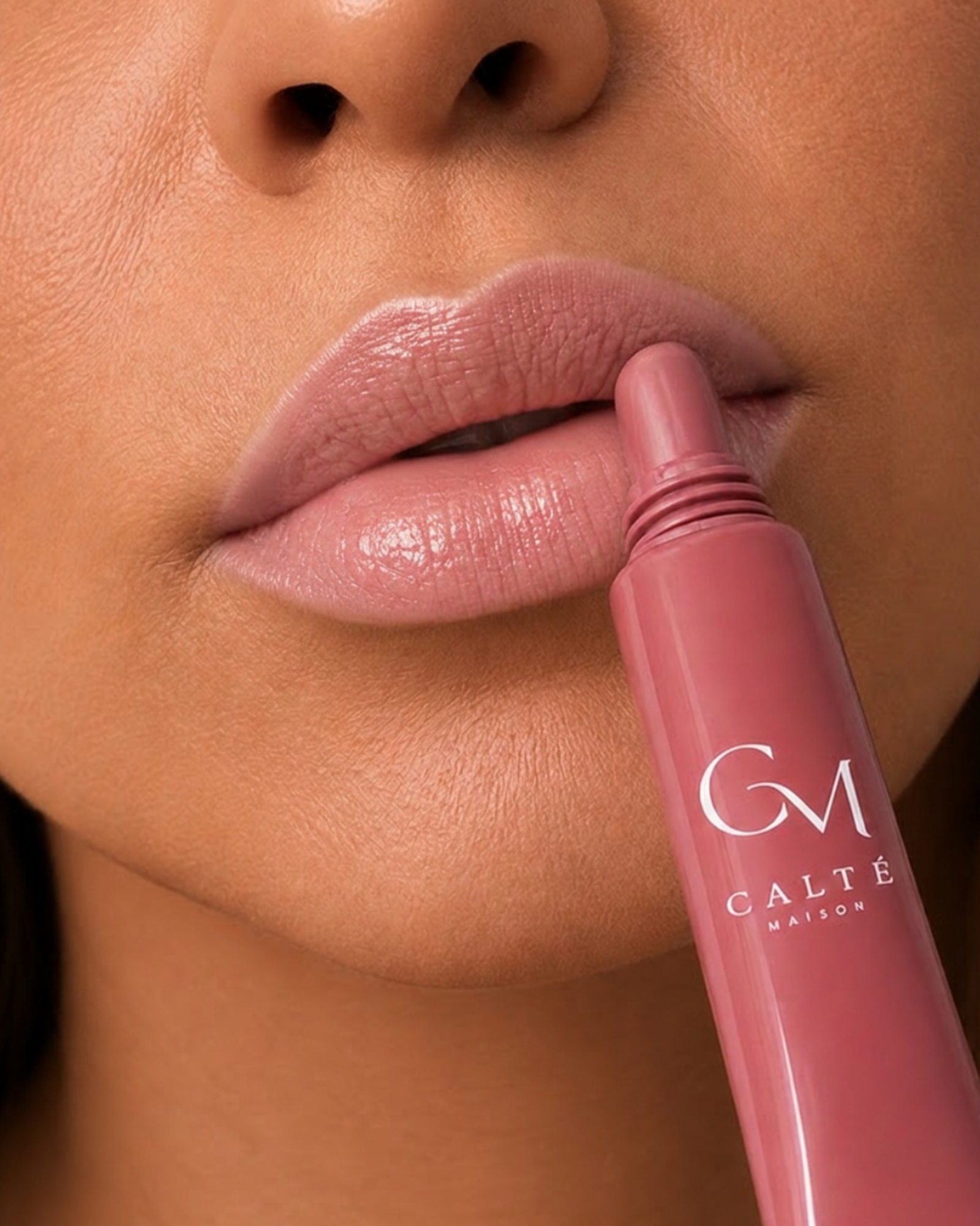 Calté Maison Tinted Lip Lift Balm in a soft pink shade